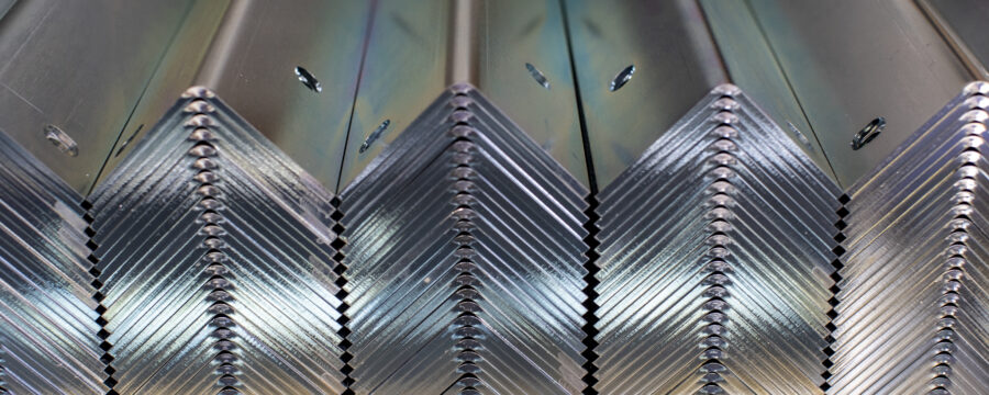 Close-up of stacked corner plates