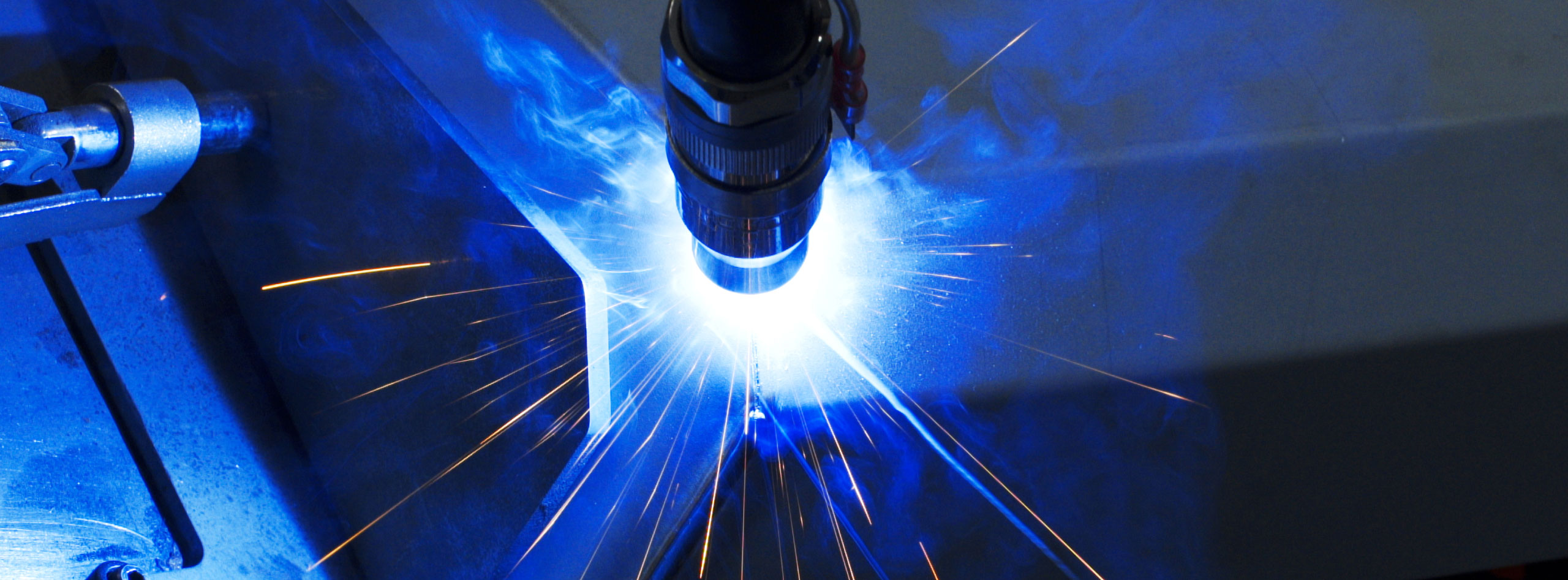 Welding robot shot with great sparks